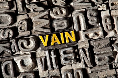 Old lead letters forming the word Vain
