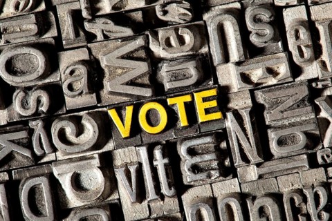Old lead letters forming the word Vote