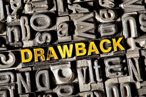 Old lead letters forming the word Drawback