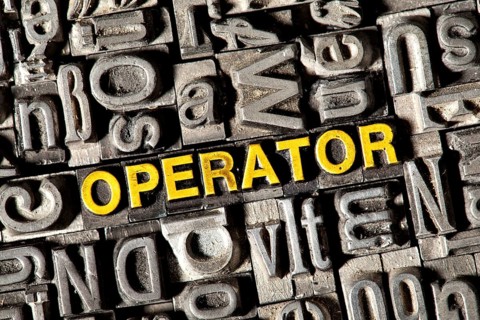 Old lead letters forming the word "OPERATOR"