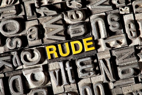 Old lead letters forming the word Rude