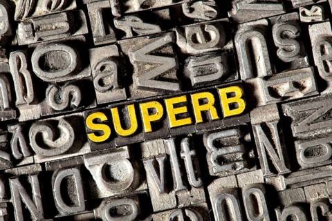 Old lead letters forming the word Superb