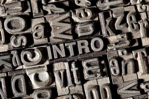 Old lead letters forming the word 'INTRO'