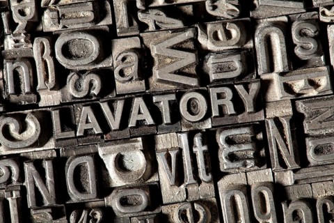 Old lead letters forming the word 'LAVATORY'