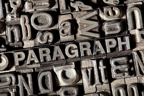 Old lead letters forming the word 'PARAGRAPH'