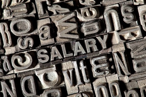 Old lead letters forming the word SALARY