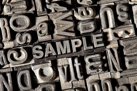 Old lead letters forming the word SAMPLE