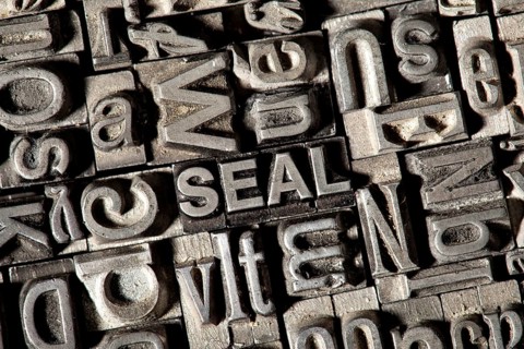 Old lead letters forming the word SEAL
