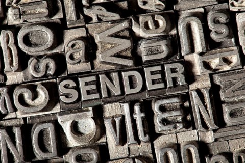 Old lead letters forming the word SENDER