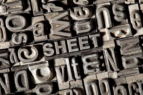 Old lead letters forming the word SHEET