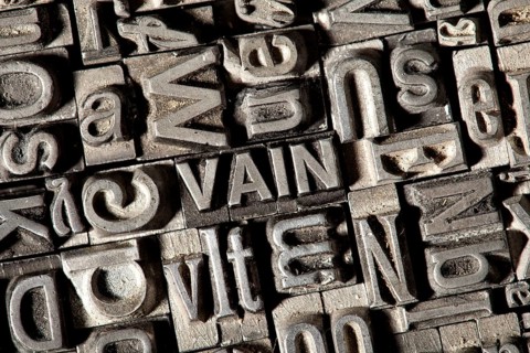 Old lead letters forming the word VAIN