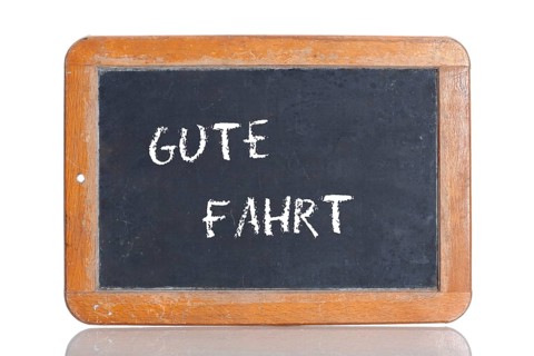 Old school blackboard with the words GUTE FAHRT