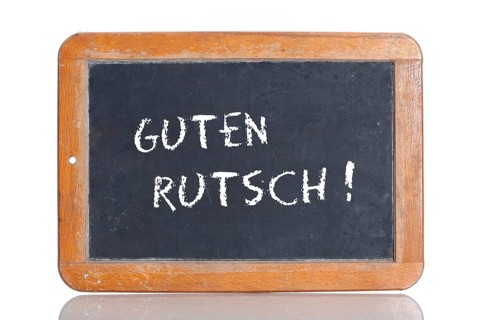 Old school blackboard with the phrase GUTEN RUTSCH!