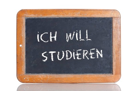 Old school blackboard with the words ICH WILL STUDIEREN