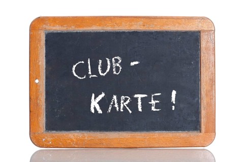Old school blackboard with the term CLUBKARTE