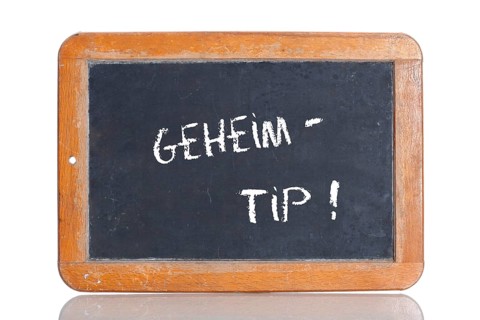 Old school blackboard with the term GEHEIMTIPP