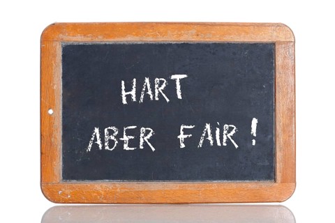 Old school blackboard with the term HART ABER FAIR