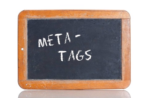 Old school blackboard with the term META TAGS