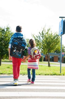 Children crossing a zebra crossing