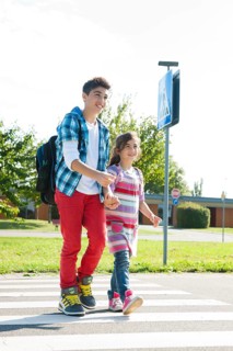 Children crossing a zebra crossing
