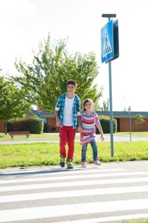 Children crossing a zebra crossing