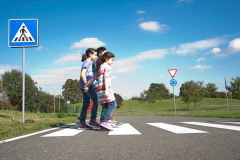 Children crossing a zebra crossing