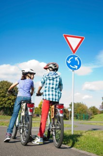 Children on bicycles at a traffic awareness course