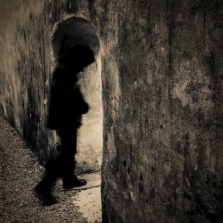 Person walking through archway