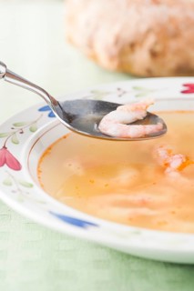 Bowl of soup with prawns
