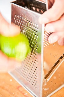 Grating lime peel with a grater