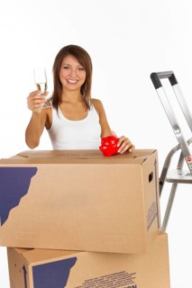 Young woman with moving boxes