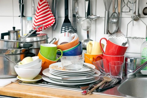 Pile of dishes in a kitchen