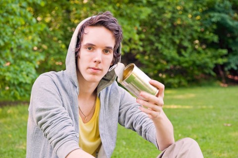 Young man sitting in nature
