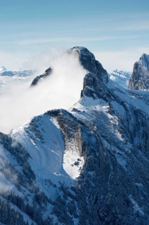 A cloud hanging next to Staubernkanzel mountain
