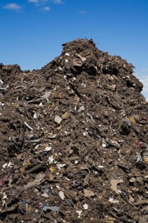 Pile of discarded automotive debris at a waste management site