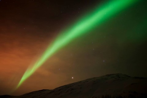 Northern Lights over the Kattfjord pass in winter