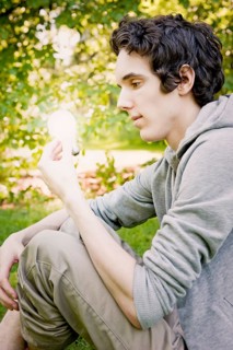 Young man sitting in nature