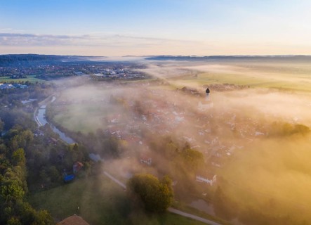 Place Gelting and Loisach canal in the fog at sunrise