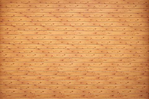 Natural colored wooden wall of rough boards