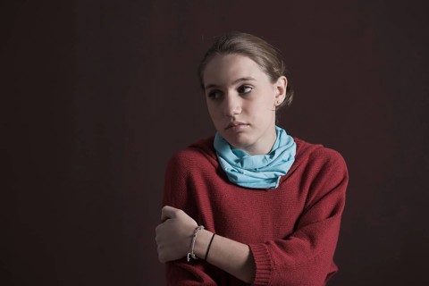 Teenage girl with a thoughtful expression