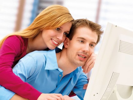 Young couple using a computer