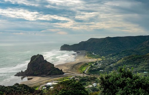 View to beach Piha Beach with Lion Rock