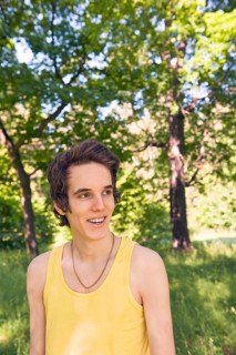 Portrait of young man in nature