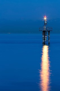 Lighthouse at Hoernle during the blue hour with a stormy atmosphere