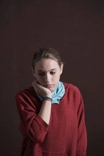 Teenage girl with a thoughtful expression