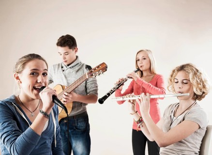 Teenagers making music together