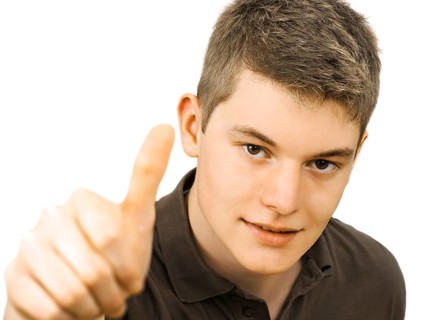 Teenager making a thumbs up gesture