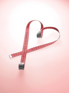 Pink tape measure shaped as a heart