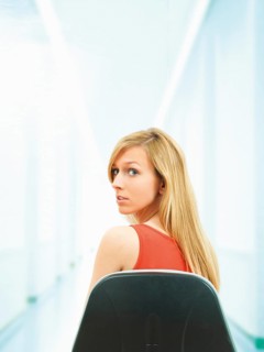 Young woman sitting on chair
