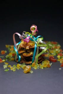 Candied orange peel and biscuits wrapped with a ribbon